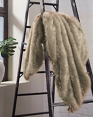 Give in to your animal instinct with the Ibrahim throw. Thick, plush and incredibly soft to the touch, its faux fur fabric is truly a dream.Polyester/acrylic | Dry clean only | Imported