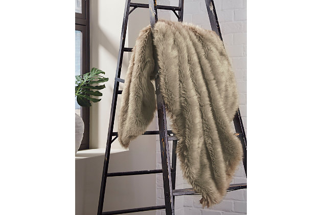 Give in to your animal instinct with the Ibrahim throw. Thick, plush and incredibly soft to the touch, its faux fur fabric is truly a dream.Polyester/acrylic | Dry clean only | Imported