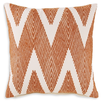 orange throw blanket and pillows