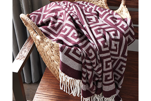 Cozy up in style with the Anitra throw. Jacquard woven Greek key design elevates the plum color. Fringe around the edges gives this throw an on trend appeal.Acrylic | Dry clean only | Imported