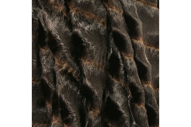 Soft, subtle and sensational, the Jessen faux fur throw is easy on the eyes and body. A dreamy addition to your reading nook or napping chair.Machine woven | Faux fur in black, brown | Acrylic, modacrylic and polyester | Dry clean only | Imported