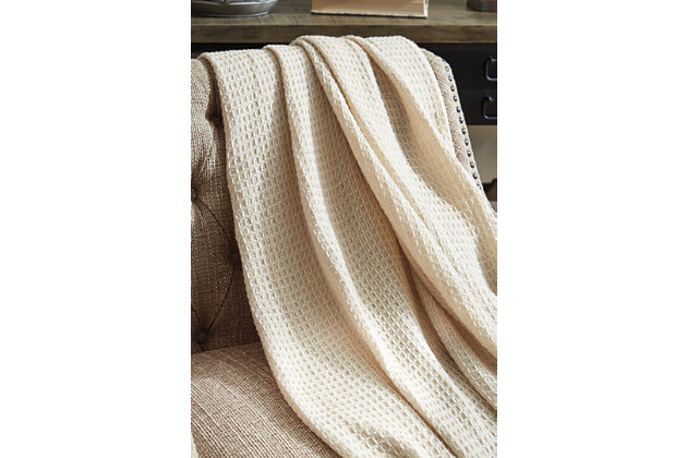 Designed using richly textured fabric and tassel edges, the Rowena throw is sure to be a go-to decor essential. Add a touch of warm to your space by draping over a chair or sofa.Made of polyester | Imported | Spot clean only