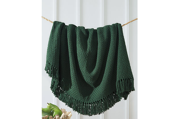 Wrap yourself in color, comfort and cozy texture with the Yasmin throw in deep green. A treat for the senses, this cotton throw is beautified with a waffle weave design and fringe details for a flirty touch.Made of cotton | Waffle weave | Fringe detail | Spot clean only