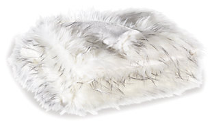 Who wouldn’t go wild for the Calisa faux fur throw? Its white faux fur takes on a whole new level with brushed black tipping. The look is so sophisticated and the feel…truly indulgent.Acrylic/polyester | Imported | Dry clean only