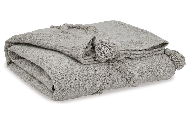 Cozy up to the Kassidy tantalizing cotton throw with gray tone-on-tone raised design. Chunky tassels add so much flair. Place it over your furniture or shoulders for extra warmth.Made of cotton | Hand woven | Tassel accents | Spot clean only | Imported