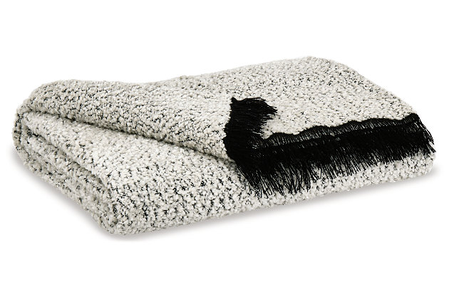 Cloudlike softness and cozy warmth make the Leonita throw nice to have around the house. Flirty black fringe and soft chenille merge a sumptuous soft feel with a richly artisan sense of style.Made of polyester/chenille blend | Handwoven | Black and white | Black fringe detail | Spot clean only | Imported