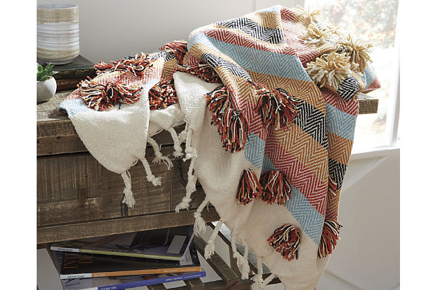 Rich with raised texture and brimming with earthy color, the Jacinta throw takes boho-chic styling to another level. With its cotton/chenille weave, this casual chic throw will have you wrapped in warmth and coolness.Made of cotton/chenille | Handwoven fringe detail | Imported | Spot clean only