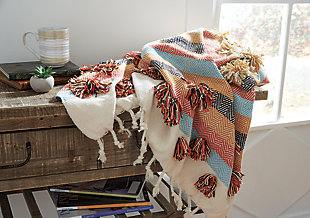 Rich with raised texture and brimming with earthy color, the Jacinta throw takes boho-chic styling to another level. With its cotton/chenille weave, this casual chic throw will have you wrapped in warmth and coolness.Made of cotton/chenille | Handwoven fringe detail | Imported | Spot clean only