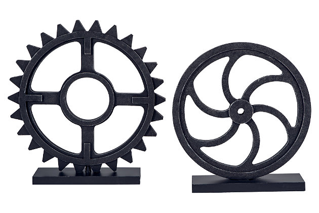 Crank up your style with this pair of wood gear sculptures in an antiqued black finish. So very urban industrial, they work beautifully on a bookshelf, mantel or table.Made of wood | Antiqued black finish | Clean with a soft, dry cloth