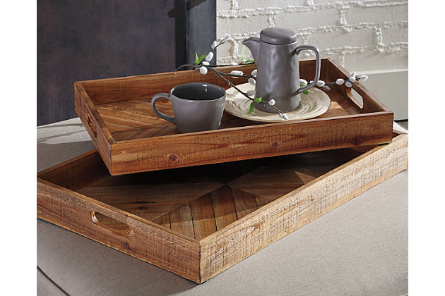 Splendidly farmhouse rustic, the Dewitt serving trays are full of woody style. Brown color gradation and chevron design bring interest to the interior. Integrated handles make for an easy serving experience.Includes 2 trays | Made of wood | Clean with a soft, dry cloth