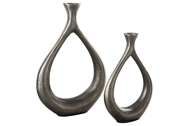 Dimaia 2-piece vase set expresses contemporary sensibility. Softly curved, keyhole silhouettes with antiqued silvertone finish place a modern-day spin on your home.Made of metal | Set of 2 | Clean with a soft, dry cloth