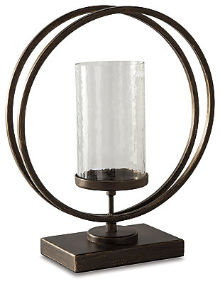 Add a splash of dimension with the Jalal candle holder. Grounded in an antiqued goldtone base, the waved glass is clearly a step above. It's the perfect addition to your eclectic collection.Holds one 3 to 4" pillar candle (not included) | Made of metal and glass | Clean with a soft, dry cloth