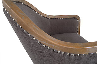 The modestly scaled Engineer accent chair is a chic design feat. Perfect for a corner spot or entryway, this curvaceous beauty sports a distressed finished frame and taupe-tone upholstery for an easy-on-the-eyes sensibility. Nailhead trim punctuating the front and back adds so much cool attitude.Attached back and seat cushions | Nailhead trim | Exposed frame in faux wood finish | Excluded from promotional discounts and coupons | Estimated Assembly Time: 15 Minutes