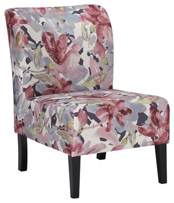 Trendy Triptis accent chair adds a fun vibe to your home. Armless design is perfect for small spaces that need a spark of excitement. Watercolor pattern in shades of plum and charcoal covers the soft fabric. Supportive cushions bring in an element of comfort.Attached back and seat cushions | High-resiliency foam cushions wrapped in thick poly fiber | Polyester upholstery | Exposed feet with faux wood finish | Excluded from promotional discounts and coupons