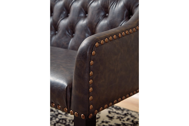 Today’s casual lifestyles call for updates to familiar profiles. The Carondelet settee is a refreshing take on traditional seating. Upholstered in a distressed faux leather with button-tufting and nailhead accents, this clean-lined bench is ready to supply extra seating in the dining room, den or entry.Distressed faux leather upholstery | Button-tufted back cushion | Brass-tone nailhead accents | Wood legs with a dark brown finish | Assembly required | Estimated Assembly Time: 30 Minutes