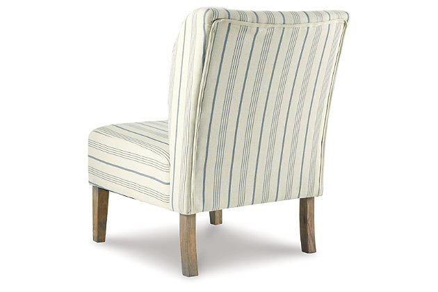 The Triptis slipper chair wows with elegant upholstery and sleek, linear design. Cool and casual, this chair is the perfect accent for the living room, dining room or bedroom. Gray-washed finish gives a fresh, vintage appeal.Attached back and seat cushions | Wood legs with gray-washed finish | Polyester/linen upholstery | Seat cushions with webbed construction | Assembly required | Estimated Assembly Time: 15 Minutes
