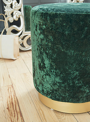 What a gem. The emerald green Lancer ottoman’s richly textured crushed velvet upholstery provides the glitz, while the goldtone metal base adds the glam. Use this precious prop as an accent table, ottoman or pouf, to suit the need.Polyester velvet upholstery | High-quality foam cushion | Metal base with goldtone finish
