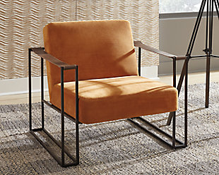 Less is so much more with the ultra-cool Kleemore accent chair. A mastery in open-concept living, this chair with sturdy metal base is enriched with thickly cushioned velvet upholstered seats. Brown leather armrests are a strapping touch.Metal base in oil-rubbed bronze-tone finish | Attached cushions | Polyester velvet upholstery over foam cushioned seat | Leather strap armrests | Estimated Assembly Time: 15 Minutes