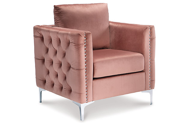 Attention divas…we've reserved you a seat! An indulgent choice for highly contemporary spaces, the painstakingly crafted Lizmont chair in blush pink lures with its sleek lines, deep tufting, silvertone sheen and velvety soft feel. If nothing but high glam will do, this sensationally styled accent chair is for you.Loose back and attached seat cushions | Polyester velvet upholstery in blush pink | Foam cushioned seat and sides | Metal legs and nailhead trim in silvertone finish | Estimated Assembly Time: 15 Minutes