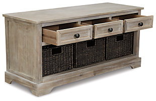 The wonderfully weathered Oslember storage bench makes what’s old fresh and new. Packed with possibilities, it’s sure to be a welcome addition everywhere from the entryway to the bedroom, home office, kitchen or mudroom. Quality construction includes three smooth-gliding drawers and a trio of woven baskets that make handy catchalls.Made of veneer, wood and engineered wood | Light brown finish | Antique bronze-tone finished metal drawer pulls | 3 smooth-gliding drawers | 3 removable woven baskets