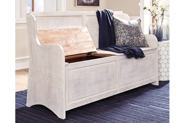 Whether gracing a front entry, living room, kitchen or mudroom, the Dannerville wood storage bench is loaded with vintage charm. Pew-style bench design and antique white finish are right on trend.Made of wood | Antique white finish | Hinged seat with storage | Estimated Assembly Time: 30 Minutes