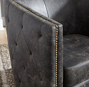 Classic style gets an urban upgrade in the Brentlow accent chair. The barrel back and tufted sides evoke swanky private clubs while the distressed black faux leather keeps it current.Barrel back and loose seat cushion | Upholstered in distressed black faux leather | Foam cushions wrapped in thick poly fiber | Tufted sides | Antiqued brass-tone nailhead detail | Metal swivel base