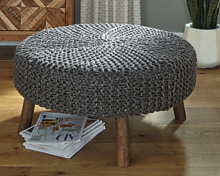 Round out your space in a casually cool way with the Jassmyn accent ottoman. Enticing with its hand-knitted charcoal yarn upholstery and canted wood legs, this oversized accent ottoman is sitting pretty.Made of polyester yarn | Hand-knitted | Charcoal gray | High-quality foam cushion | Wooden legs in brown finish | Estimated Assembly Time: 15 Minutes