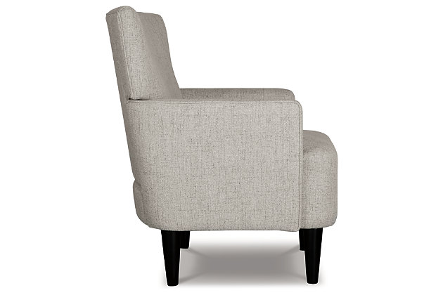Tailor your space to your own tastes with the Hansridge accent chair. Track arms and a sesame beige upholstery create a crisp impression. Exposed legs in a black finish add to the air of modernity.Made of polyester and wood | Sesame beige polyester upholstery | Attached back and seat cushions | Exposed wood legs in black finish | Assembly required | Estimated Assembly Time: 30 Minutes