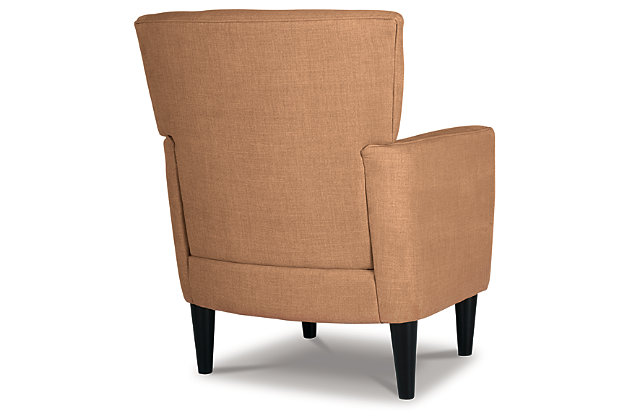Tailor your space to your own tastes with the Hansridge accent chair. Track arms and a rust upholstery create a crisp impression. Exposed legs in a black finish add to the air of modernity.Made of polyester and wood | Polyester upholstery | Attached back and seat cushions | Exposed wood legs in black finish | Assembly required | Estimated Assembly Time: 30 Minutes