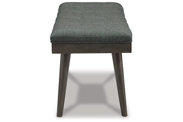 Mid-century sensibility shows up well in the Ashlock bench. The tufted gray upholstery is buttoned up like a dress shirt over the tapered wood legs and apron. Tuck this modern gem into your entryway for a cool seat while removing your shoes or set it at the end of your bed for a touch of vintage style.Made of polyester and wood | Polyester fabric upholstery | Tufted seat cushion | Wood apron and legs in gray finish | Assembly required | Estimated Assembly Time: 15 Minutes