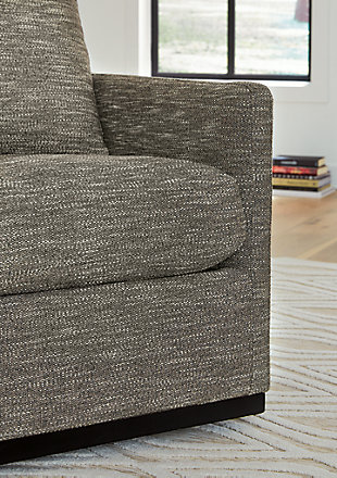Talk about head-turning style. The Grona accent chair is perfect for your living room or bedroom and its gentle swivel motion keeps everyday relaxation easy-breezy. You'll love its staying power.Attached back cushion and loose seat cushion | Textured brown polyester upholstery | Dark brown wood trim base with metal swivel | Track arms with upholstered detail | No assembly required