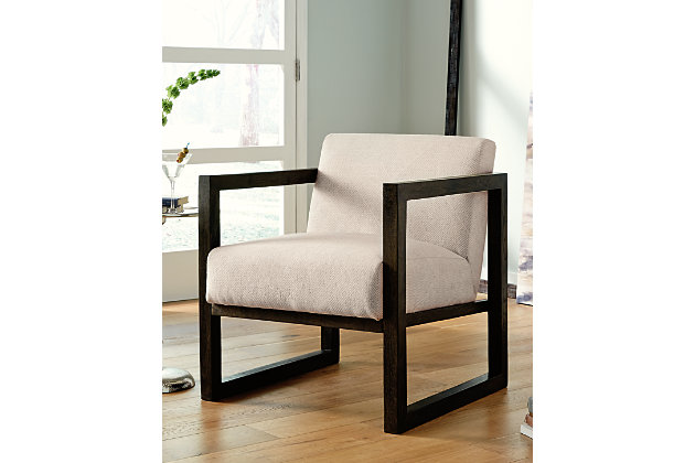 A wire brushed frame in brown finish, a slight pitched back and two-tone cream upholstery is the Alarick accent chair. Perfect on its own or pair it up.Wood and polyester | Attached back and seat cushion | Wood frame | Easy assembly | Estimated Assembly Time: 30 Minutes
