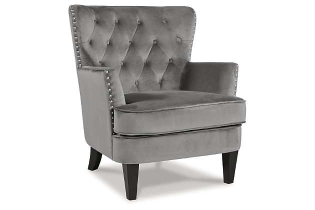 Don't leave your living room incomplete. Fill the open space with the Romansque accent chair. Slim track arms and nailhead trim give this traditional silhouette an updated and inviting appeal. The diamond tufted back cushion and attached seat cushion are an absolute pleasure to sit in. Alone or paired with other upholstery, this chair is a class act.Gray polyester velvet upholstery | Diamond tufted back | Attached seat cushion | Silver finished nailhead trim | Wood legs in black finish | Minimal assembly required | Estimated Assembly Time: 15 Minutes