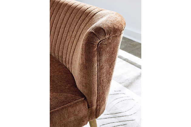 The Collbury settee boasts couture-inspired detailing with its curved sides and contemporary/mid-century allure. Channel stitched back design with natural wood tapered legs elevates its luxe appeal with feel-good cognac brown colored polyester fabric putting comfort in style.Beige polyester upholstery | Wood legs with natural finish | Attached back and seat cushion | Easy assembly | Estimated Assembly Time: 30 Minutes
