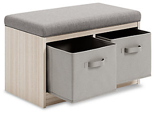 Sit and store in style. Blariden storage bench is topped with a cool gray cushion for a soft touch. Its removable fabric baskets are perfect for storing cold-weather essentials or keeping clutter under wraps. A light tan finish cleanly completes the look. Works wonders in your child's bedroom or play space.Made with engineered wood and veneer | Gray polyester seat cushion | 2 open cubbies, each with fabric basket | Solid wood legs in dark brown finish | Assembly required | Estimated Assembly Time: 60 Minutes