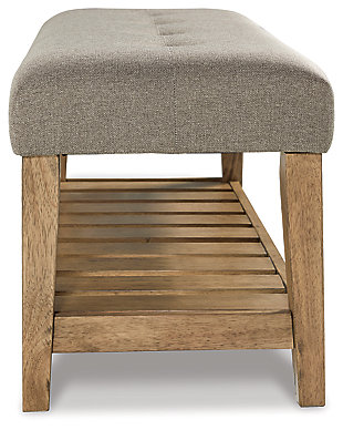 The solid construction and timeless style of the Cabellero bench make it the perfect accent piece in your living room, bedroom or entryway. A wood slat storage shelf and cushioned top add a sense of airy sophistication and charming rustic style.Solid wood in medium brown finish | Attached tufted seat cushion in beige polyester upholstery | Wood slat shelf | Assembly required | Estimated Assembly Time: 15 Minutes