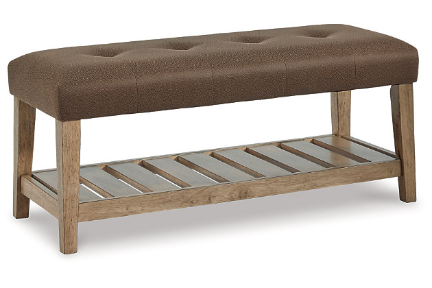 The solid construction and timeless style of the Cabellero bench make it the perfect accent piece in your living room, bedroom or entryway. A wood slat storage shelf and cushioned top add a sense of airy sophistication and charming rustic style.Solid wood in medium brown finish | Attached tufted seat cushion in brown faux leather upholstery | Wood slat shelf | Assembly required | Estimated Assembly Time: 30 Minutes