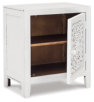How could you not stare at a masterpiece? The floral carving on the Fossil Ridge accent cabinet is simply magnificent. This beauty is also functional. Pull the door open to reveal storage space with a handy shelf. With its antiqued white finish, this piece is a definite showstopper.Made of wood, engineered wood and veneers | Antiqued white finish | 1 cabinet with door and shelf | Estimated Assembly Time: 30 Minutes