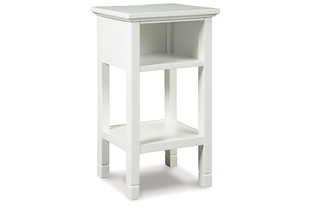 Your home called. It asked for the Marnville accent table. Crisp white finish is simply irresistible, elevating the silhouette with elegance. Clean lines maintain the contemporary aesthetic you crave. Open cubby and bottom shelf provide storage for essentials and decor. Power up your devices with USB ports. How’s that for form and function?Made of wood, engineered wood and veneers | White finish | 1 open cubby and bottom shelf | 2 USB charging ports | Power cord included; UL Listed | Estimated Assembly Time: 15 Minutes