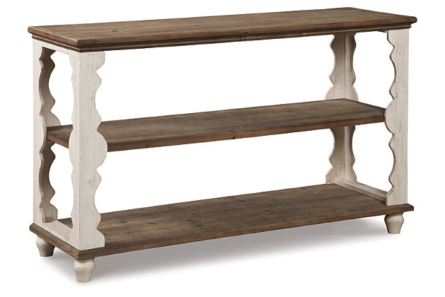 Simply put, the Alwyndale console sofa table is minimalism with maximum charm. Naturally finished knotty wood combined with antiqued white is an artful combination. But what really makes this console sofa table so spectacular: scalloped woodwork you just don’t see every day.Made of wood | Natural and antiqued white finishes | 2 fixed shelves | Estimated Assembly Time: 15 Minutes