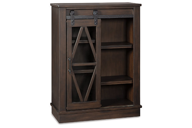 Put your love of modern farmhouse living on display with the Bronfield accent cabinet. Rich brown finish and sliding "barn door" make it loaded with character. Four adjustable shelves are packed with potential.Made of wood and engineered wood | Black finished metal hardware | Sliding door with glass panel front | 4 adjustable shelves | Assembly required | Estimated Assembly Time: 30 Minutes