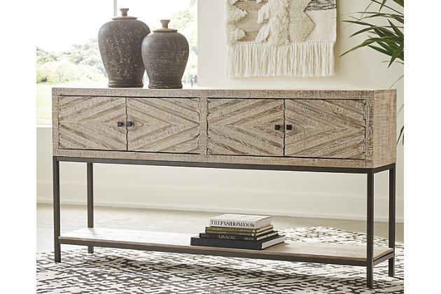Make a cool, contemporary statement with the Roanley console sofa table. Sporting diamond-carved cabinet door fronts with great dimension, this designer piece is an inspired choice for an entryway, dining room or living space. Combination of distressed white wood and black metal is so striking.Made of wood and engineered wood | Distressed white finish | Black metal hardware | 4 doors | 1 shelf | Assembly required | Estimated Assembly Time: 60 Minutes