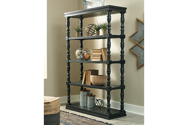 With its antique black finish, plank-effect styling and charming turned details, the Dannerville bookcase is sure to elevate the look and feel of a room. Whether you embrace traditional decor or fancy modern farmhouse style, this 5-tier open bookcase will look right at home.Made of veneer, wood and engineered wood | Antique black finish | 5 tiers | Assembly required | Estimated Assembly Time: 45 Minutes