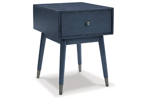 A study in seeming contradictions, the Paulrich accent table is both practical and stylish. A storage drawer lets you keep necessary items in reach while out of sight, and two USB ports keep your devices powered up as you wind down. The clean lines and antique blue finish give this piece a high-design profile to elevate your space.Made of veneer, solid and engineered woods | Antiqued blue finish | Pewter-tone hardware | 1 drawer | 2 USB charging ports | Assembly required | Estimated Assembly Time: 15 Minutes