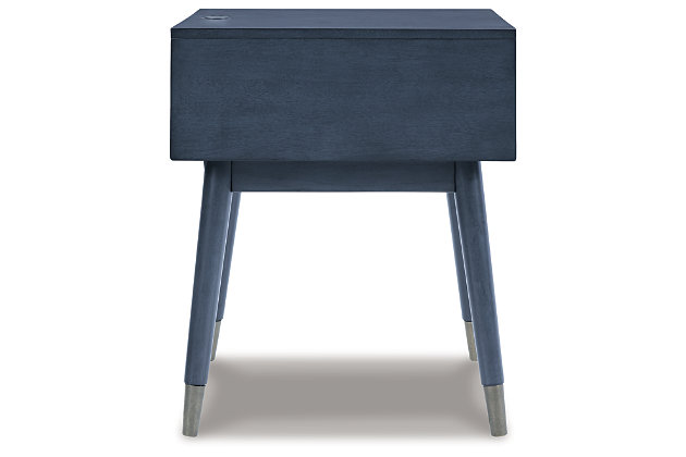 A study in seeming contradictions, the Paulrich accent table is both practical and stylish. A storage drawer lets you keep necessary items in reach while out of sight, and two USB ports keep your devices powered up as you wind down. The clean lines and antique blue finish give this piece a high-design profile to elevate your space.Made of veneer, solid and engineered woods | Antiqued blue finish | Pewter-tone hardware | 1 drawer | 2 USB charging ports | Assembly required | Estimated Assembly Time: 15 Minutes