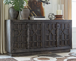 Whether you decide to use it as dining room storage or a living room TV stand, your love of unique style will shine front and center with the Roseworth accent cabinet. The 4 distressed patterned door fronts finished in black and 2 fixed shelves add stylish versatility filled with possibilities.Solid and engineered wood | Distressed black finish | 4 doors | 2 fixed shelves | Cord openings in back | Assembly required | Estimated Assembly Time: 60 Minutes