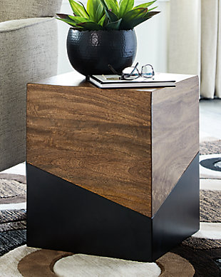 For those with discriminating tastes and a desire to be different the two-tone Trailbend accent table is, above all, eclectic, offering a unique conversation piece to contemporary decors. This table shines with eye-catching interest that won’t be soon forgotten by guests. Use in pairs for double the impact.Solid wood and engineered wood | Light brown and dark gray finishes | No assembly required