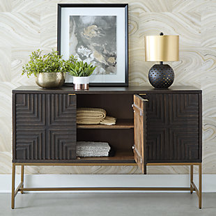The Elinmore accent cabinet is a versatile stunner with 3 geometric patterned door fronts in warm dark brown accented with goldtone finish metal hardware. Standing on a goldtone metal open frame base, the three-door console is aesthetically contemporary and sophisticated, ready to serve as buffet, console or media cabinet.Solid and engineered wood | 3 door fronts | 3 fixed shelves | Cord openings in back | Assembly required | Estimated Assembly Time: 45 Minutes