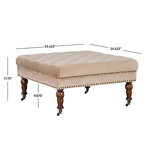 Square tufted ottoman on metal casters brings high style and versatility to your living space. Perfect as a footrest or coffee table, it wows with a tufted top and velvety soft tan fabric. Antiqued brass-tone nailheads accent the side, while turned dark walnut legs complete the richly traditional look.Made of birch wood | Foam cushioned seat covered in velvet polyester upholstery | Tufted top | Antiqued brass-tone nailhead trim | Dark walnut-tone finished legs | Metal casters | Assembly required