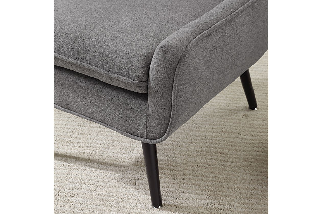 Can’t decide between modern and mid century? Enjoy the best of both trends with this fashion-forward retro chair in gray. Sporting architectural angles, canted legs and button tufting, it’s seating taken to an art form.Made of wood and engineered wood | Foam cushioned seats | Gray polyester fabric | Button tufting | Legs in black finish | Some assembly required